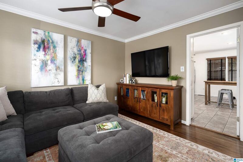 Living room with a sectional and television
