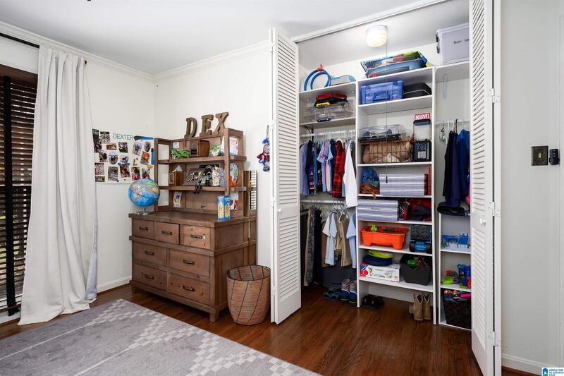 Bedroom closet with built-in shelving