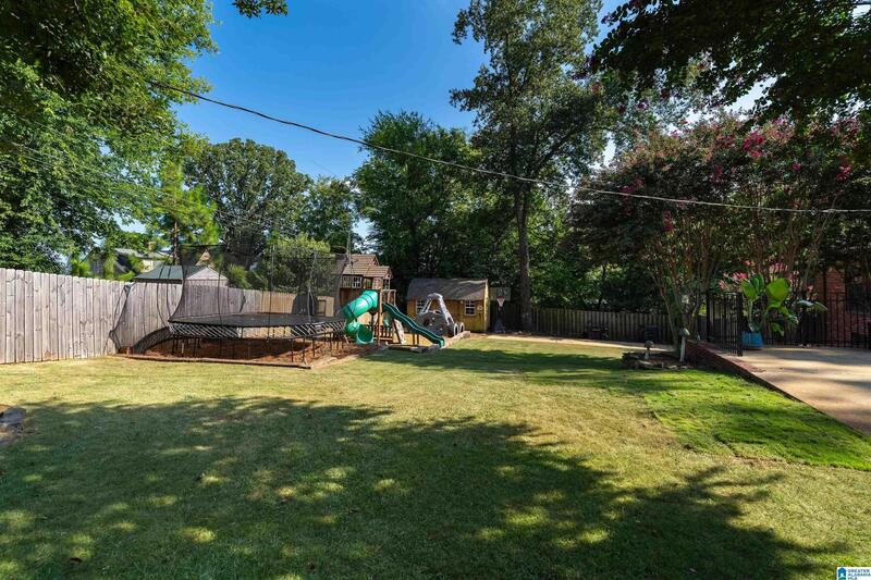 Fenced backyard and lawn
